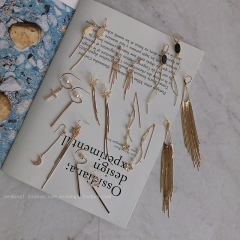 Asymmetric tassel earrings