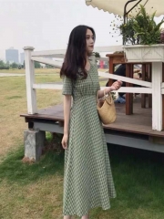 Fields and gardens wind a full skirt